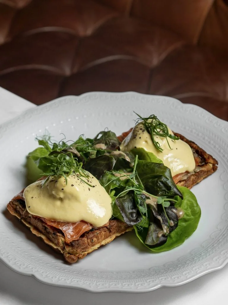 Les Œufs Royaux sur Gaufres Salées, Eggs Royale on Potato Waffle with salmon cold-smoked over coffee wood and hollandaise, at brunch at Gooseberry, Uluwatu